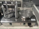 an image of a commercial fryer with a basket on top of it