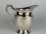 an image of a silver pitcher on a white background