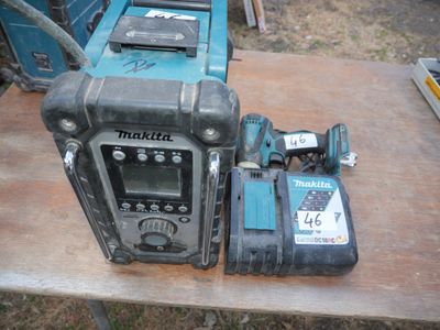 a picture of a cordless drill and a power tool on a table