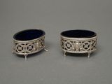 pair of silver and blue glass dishes on stands