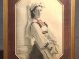 portrait of a woman in a sailor ' s outfit in a frame