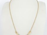 a gold and diamond necklace on a mannequin mannequin mannequin mannequin mannequin mannequin mannequin mannequin mann