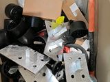 a cardboard box full of assorted items in it
