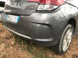 a car that is parked on the grass in the yard