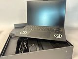a laptop sitting in a box on a table