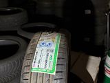 a pile of tires sitting on the floor in a garage