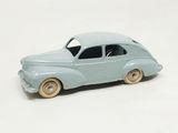 a toy car that is sitting on a white surface