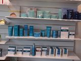 a shelf with many products on it in a store