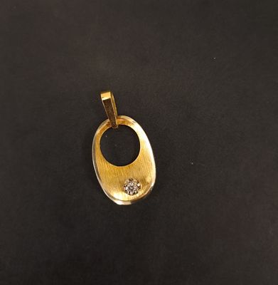 Pendentif moderniste en or jaune 18K (750‰) partiellement am…