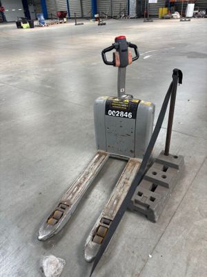 a picture of a forklift in a warehouse