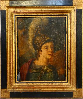 portrait d'un jeune homme dans un cadre doré, avec une couronne sur la tête