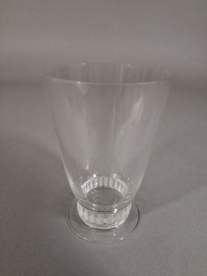 a glass that is sitting on top of a table
