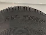 a close up of a tire with the words all terrain written on it