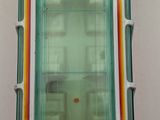 a small refrigerator that has a glass door in it