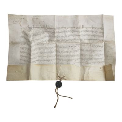 un morceau de papier portant un cachet de cire