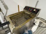an image of a commercial fryer in a kitchen