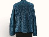 the back of a blue sweater on a mannequin mannequin mannequin mannequin mannequin mannequin mannequin mannequin