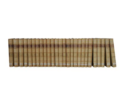 a row of old books sitting on top of each other