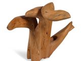 a wooden sculpture of a bird made out of wood