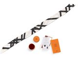 black and white chevron necktie with a cup of coffee and a notepad