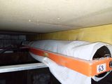 a picture of a roll of toilet paper hanging from the ceiling