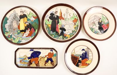 four decorative plates with a painting of people on them on a white surface