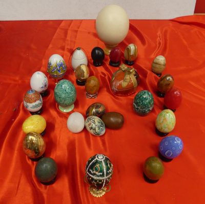 a lot of eggs on a red table cloth