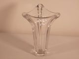a glass vase that is sitting on a table