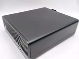 the computer is sitting on a white surface with a white background
