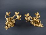 pair of antique brass candlesticks with angels and flowers