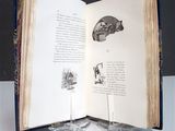an open book with a picture of a train on it
