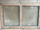 an old wooden window with a glass pane in it