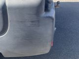 rear end of a blue car with a red tail light on it