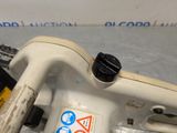 a close up of a sewing machine on a table