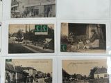 a picture of a collection of old postcards on a table
