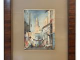 framed painting of a street scene with a clock tower in the background