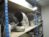 many pots and pans on a shelf in a room