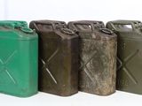 three green and three brown jerry cans sitting next to each other