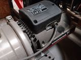 a motor that is sitting in the back of a truck