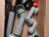 a box with a bunch of plumbing items inside of it