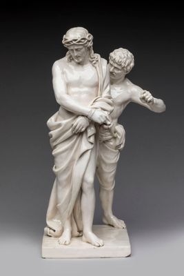 an image of a statue of a man holding a child