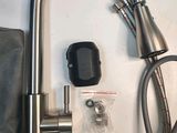 a faucet that is sitting on a counter top