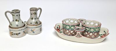a small tray with cups and vases on it