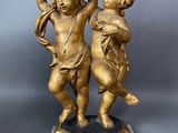 pair of antique bronze figurines of cherensils on marble base