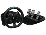a close up of a steering wheel and pedals on a white background