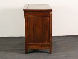 an image of a small wooden cabinet with a marble top