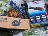 a box full of assorted items sitting on a table