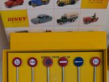 a yellow box with six different toy cars in it