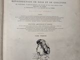 an open book with a drawing of a bird on it ' s cover