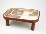 a coffee table that has a design on the top of it